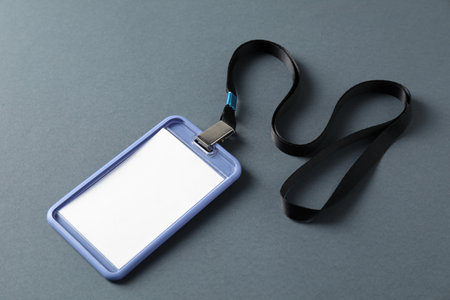 Blank badge with string on gray background
