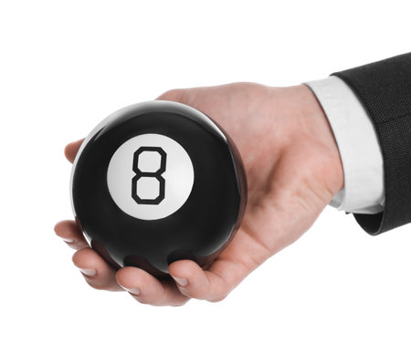 Man holding magic eight ball on white background, closeupの写真素材
