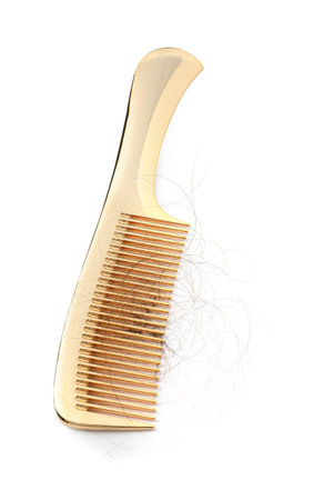 Comb with lost hair isolated on white