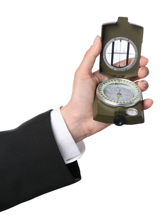 Woman holding compass on white background, closeup