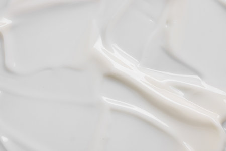 Texture of face cream as background, closeup