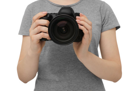 Photographer with camera on white background, closeupの写真素材