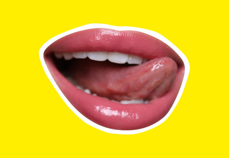 Beautiful woman's lips with white outline on yellow background. Magazine cutout, stylish designの写真素材