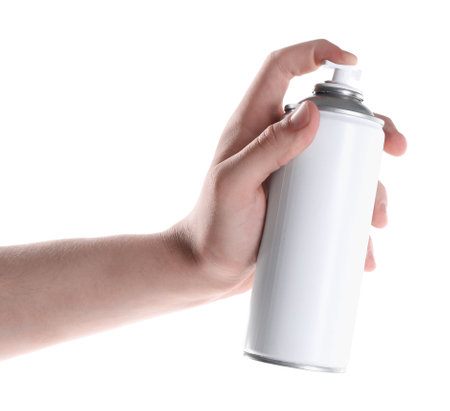 Man with can of spray paint on white background, closeupの写真素材