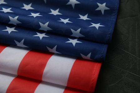 Flag of USA on black table, closeup