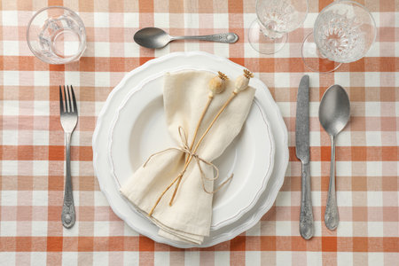 Stylish setting with cutlery and plates on table, flat layの写真素材