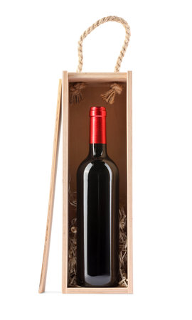 Wooden gift box with wine bottle isolated on whiteの写真素材
