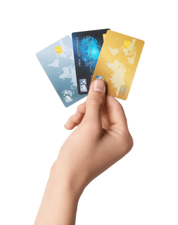 Man holding credit cards on white background, closeupの写真素材