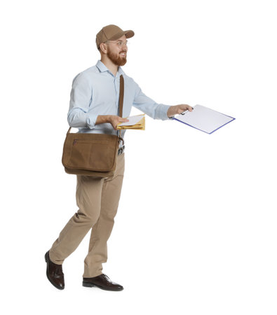 Happy young postman with brown bag delivering letters on white background