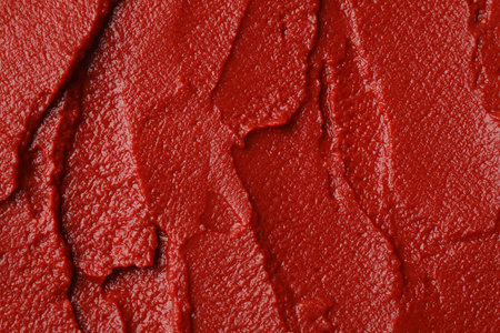 Texture of ketchup as background, top view. Tomato sauceの写真素材