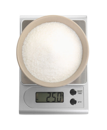 Kitchen scale with bowl of sugar isolated on white, top viewの写真素材