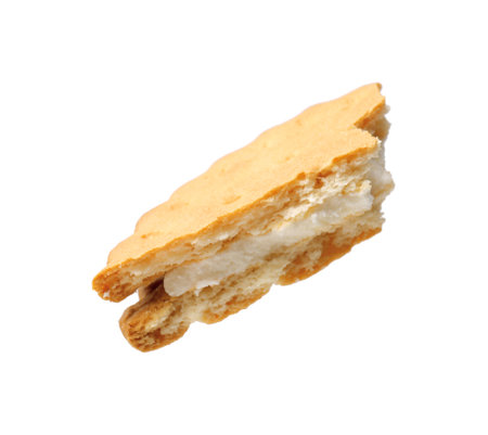 Piece of tasty sandwich cookie isolated on whiteの写真素材