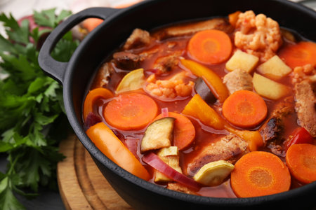 Tasty homemade stew with vegetables on table, closeupの写真素材