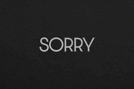 Word Sorry on black background, apology card designの写真素材