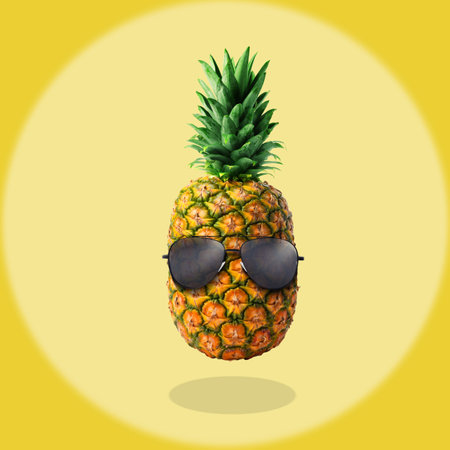Summer vibe. Pineapple with sunglasses on color background. Party flyer or other seasonalの写真素材