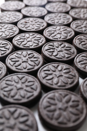 Many tasty sandwich cookies on table, closeupの写真素材