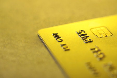 Plastic credit card on table, macro view. Space for textの写真素材