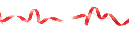 Two beautiful red ribbons isolated on white, top view