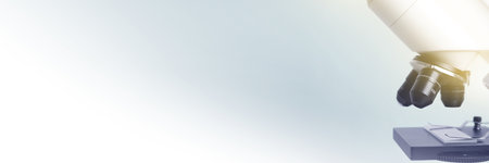 Microscope on light background, closeup. Banner design with space for text
