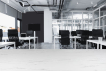 Empty white marble table in office. Space for designの写真素材