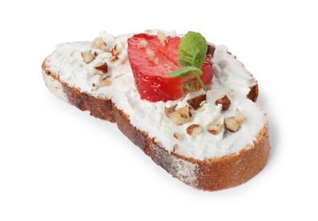 Delicious bruschetta with fresh ricotta (cream cheese), walnuts, strawberry and mint isolated on whiteの写真素材
