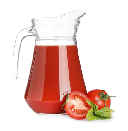Tasty tomato juice in glass jug, fresh vegetables and basil isolated on whiteの写真素材