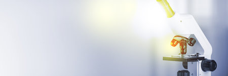 Microscope on blurred background, closeup. Banner design with space for text