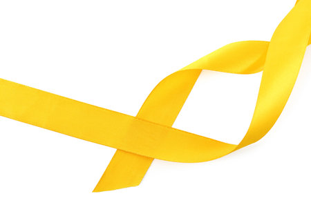 One beautiful yellow ribbon isolated on white, top viewの写真素材