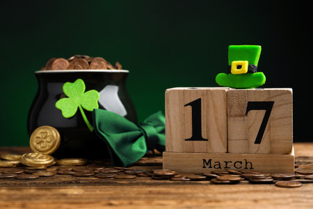 Composition with block calendar on wooden table. St. Patrick's Day celebrationの写真素材