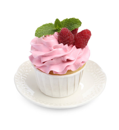 Tasty cupcake with raspberries and mint isolated on whiteの写真素材