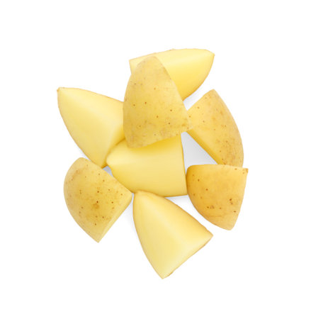 Pile of fresh cut potato isolated on white, top viewの写真素材