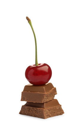 Fresh cherry with pieces of milk chocolate isolated on whiteの写真素材