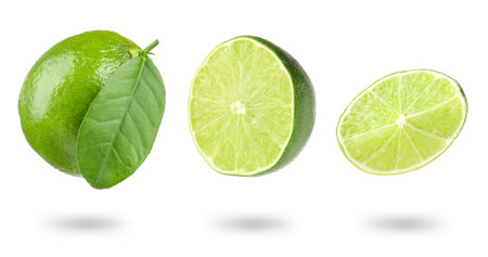 Fresh lime isolated on white, collage. Whole, half and sliceの写真素材