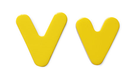 Uppercase and lowercase yellow magnetic letter V isolated whiteの写真素材