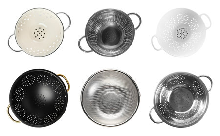 Set of different colanders isolated on white, top view