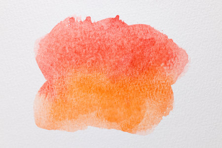 Colorful watercolor painting on white paper, top viewの写真素材