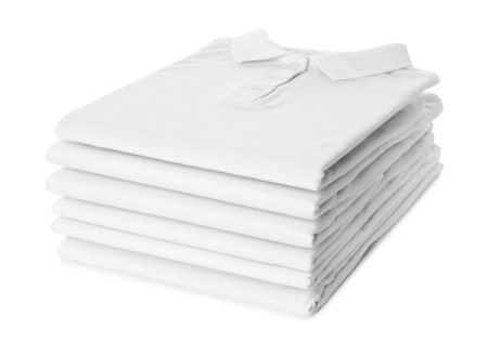 Stack of clean t-shirts isolated on whiteの写真素材