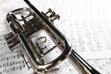 Trumpet on music sheet papers with notes, closeupの写真素材