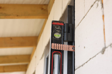 Building level near newly installed door, closeup