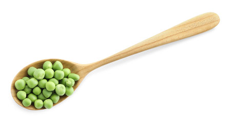 Spoon with fresh green peas isolated on white, top viewの写真素材