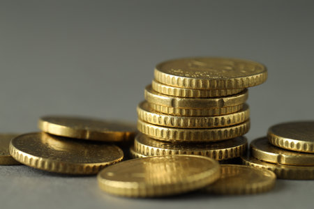 Many euro coins on gray background, closeupの写真素材