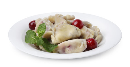 Traditional Ukrainian dumplings (varenyky) with cherries isolated on whiteの写真素材