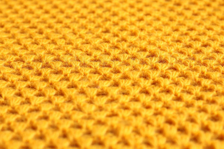 Texture of orange knitted fabric as background, closeupの写真素材