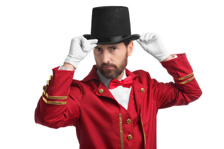 Portrait of showman in red costume and hat on white backgroundの写真素材