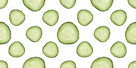 Round cucumber slices on white background, pattern designの写真素材