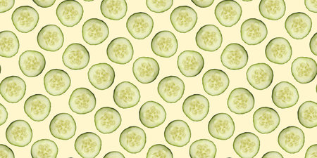 Round cucumber slices on beige background, pattern designの写真素材