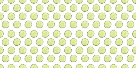 Round cucumber slices on white background, pattern designの写真素材