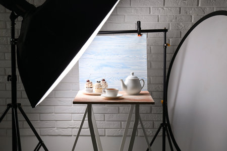 Shooting food in photo studio with professional lighting equipment