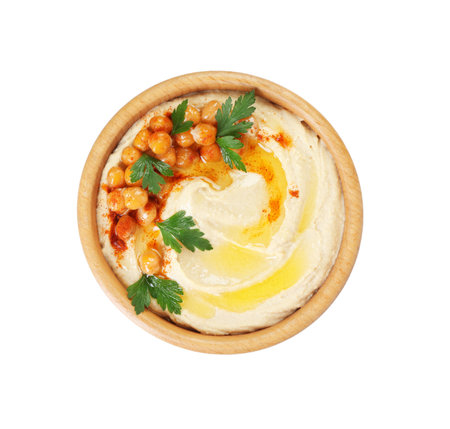 Delicious hummus with olive oil, chickpeas and parsley isolated on white, top viewの写真素材