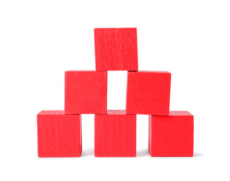 Many red wooden cubes isolated on whiteの写真素材
